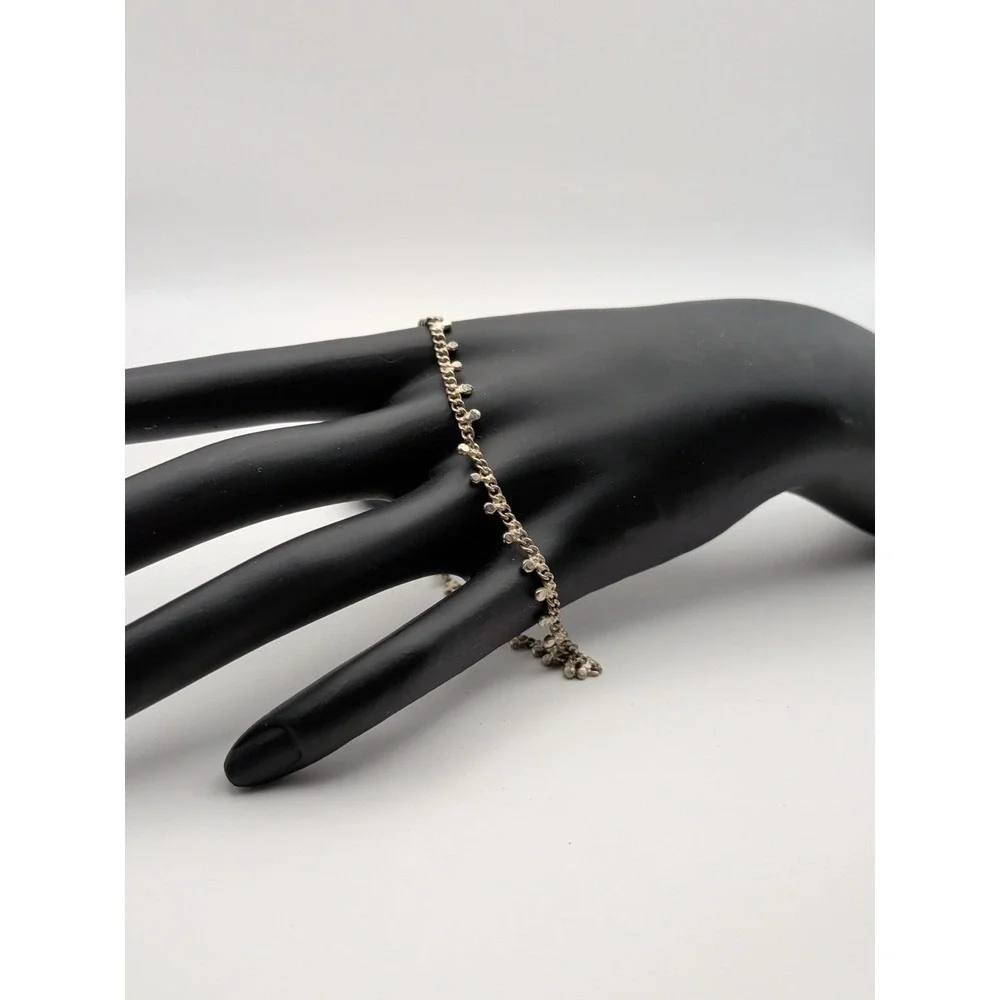 Silver Toned Chain Bracelet With Round Charms